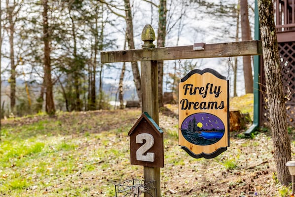 A wooden sign with the text "Firefly Dreams" and a number "2" indicating a specific location or room. - Pond View! Great Location! Close to Attractions Family and Pet Friendly! (Sevierville)