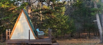 Two cozy pods with water tower and UTV rentals