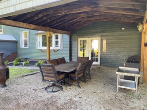 Outdoor dining - Spacious PA Wilds Getaway! Water views, firepit w/ covered patio (Driftwood)