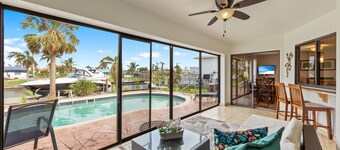 Gulf access waterfront home with boat dock, 4BRs, 2 BAs, sleep 10+ walk to beach