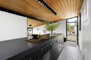 Fridge, oven, stovetop, dishwasher - Architect designed holiday home with sea view (Gudhjem)