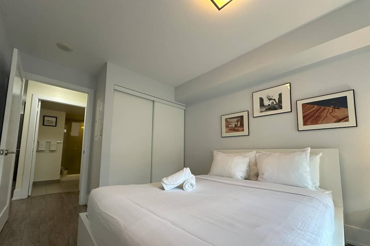 2 bedrooms, premium bedding, blackout drapes, iron/ironing board