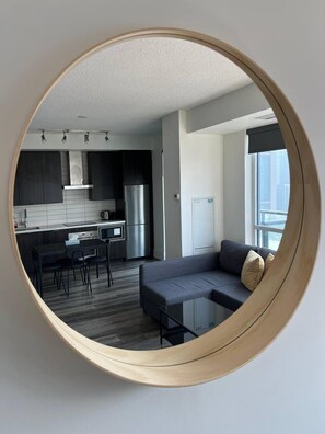 City Apartment, 1 Queen Bed with Sofa bed, City View | Living area | 55-inch flat-screen TV with digital channels, TV, streaming services - RivetStays - The Atmos (Toronto)