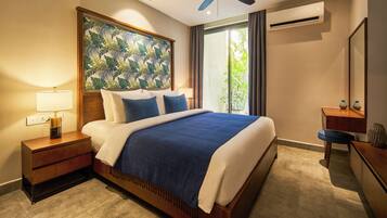 Premium bedding, down comforters, pillowtop beds, in-room safe