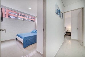 2 bedrooms, desk, iron/ironing board, travel crib