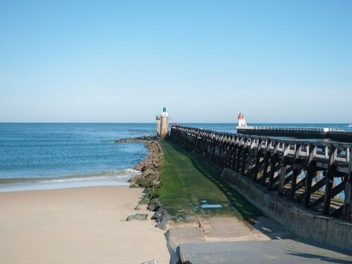 Apartment near beach with pool, parking, and pets allowed