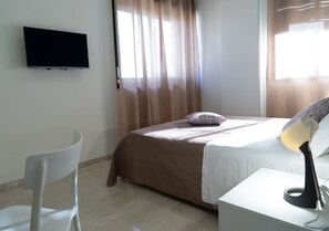 Habitación Confort | Minibar, caja fuerte, sistema de insonorización