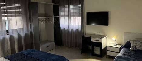 Quarto triplo conforto | Frigobar, cofres nos quartos, quartos à prova de som