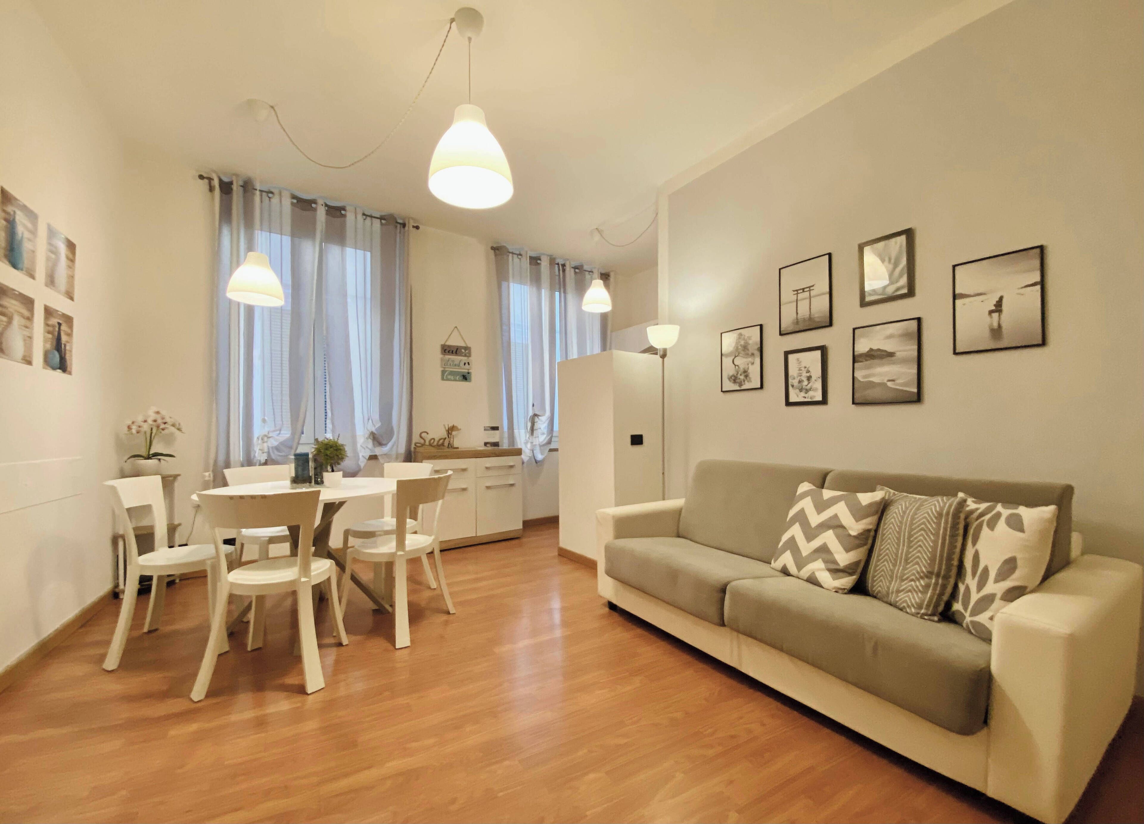 City Apartment | Living area | 48-inch flat-screen TV with digital channels, TV