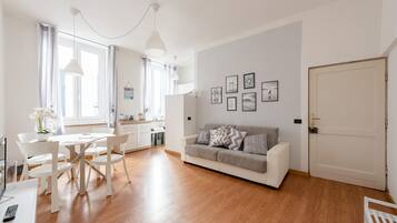 City Apartment | Living area | 48-inch flat-screen TV with digital channels, TV