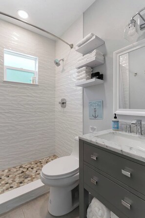 Hair dryer, towels, soap, shampoo