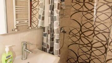 Hair dryer, towels, soap, toilet paper