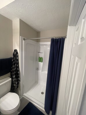 Hair dryer, towels, soap, shampoo