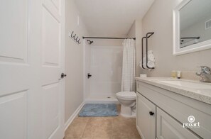 Shower, hair dryer, towels, soap