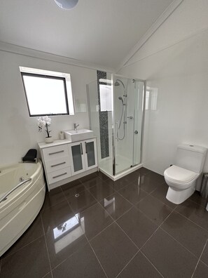Jetted tub, towels, soap, toilet paper