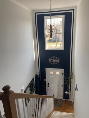 A staircase leading to a door with a sign above it. - Cozy 4 Bedroom 3 Bath, 3 miles from PSU campus/downtown in quiet neighborhood  (State College)