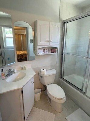Hair dryer, towels, soap, shampoo