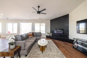 Smart TV, fireplace, books