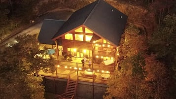 Escape to a secluded cabin surrounded by forested tranquility.