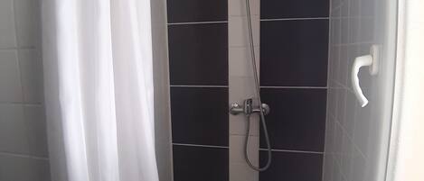 Shower, hair dryer, soap, shampoo