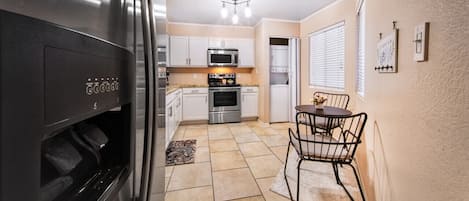 Coffee/tea maker, fridge, microwave, oven