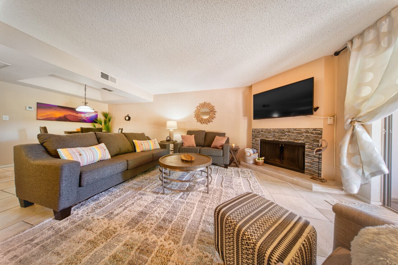 Smart TV, fireplace, books, offices