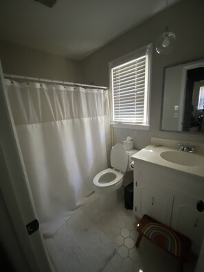 Hair dryer, towels, soap, shampoo