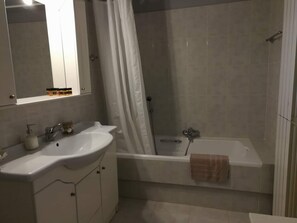 Hair dryer, towels, soap, shampoo