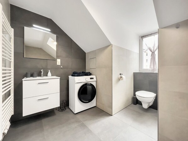 Hair dryer, towels, soap, shampoo