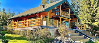 Log house with private beach and own dock incl. boat