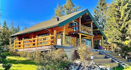 Log house with private beach and own dock incl. boat