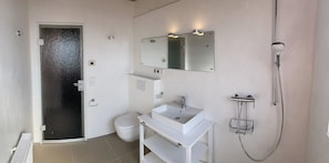 Shower, hair dryer, towels, soap