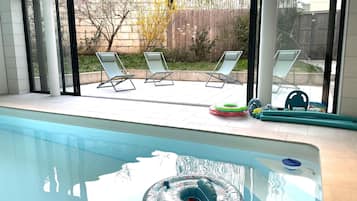 Alberca techada y alberca climatizada