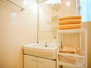 Hair dryer, towels, shampoo