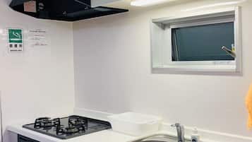 Fridge, microwave, stovetop, cookware/dishes/utensils