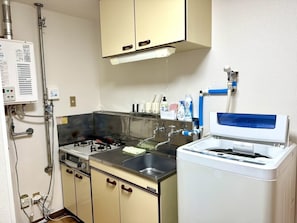 Fridge, microwave, stovetop, cookware/dishes/utensils