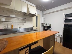 Fridge, microwave, stovetop, cookware/dishes/utensils