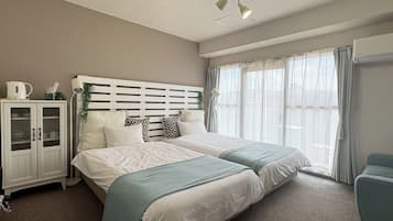 1 室のベッドルーム、デスク、WiFi (無料)、ベッドシーツ