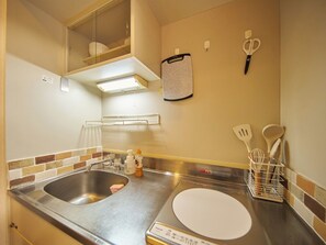 Fridge, microwave, stovetop, cookware/dishes/utensils