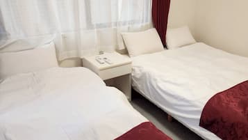 2 室のベッドルーム、デスク、WiFi (無料)、ベッドシーツ