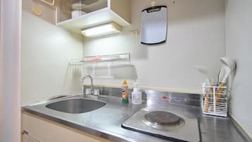 Fridge, microwave, stovetop, cookware/dishes/utensils