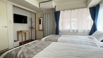 1 室のベッドルーム、デスク、WiFi (無料)、ベッドシーツ