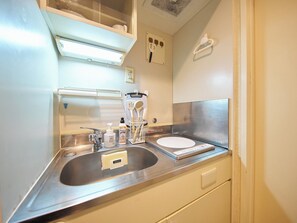 Fridge, microwave, stovetop, cookware/dishes/utensils