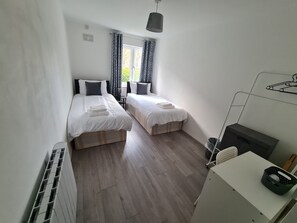 2 bedrooms, desk, iron/ironing board, travel cot