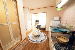 Fridge, microwave, cookware/dishes/utensils