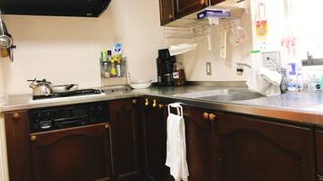 Fridge, microwave, stovetop, cookware/dishes/utensils