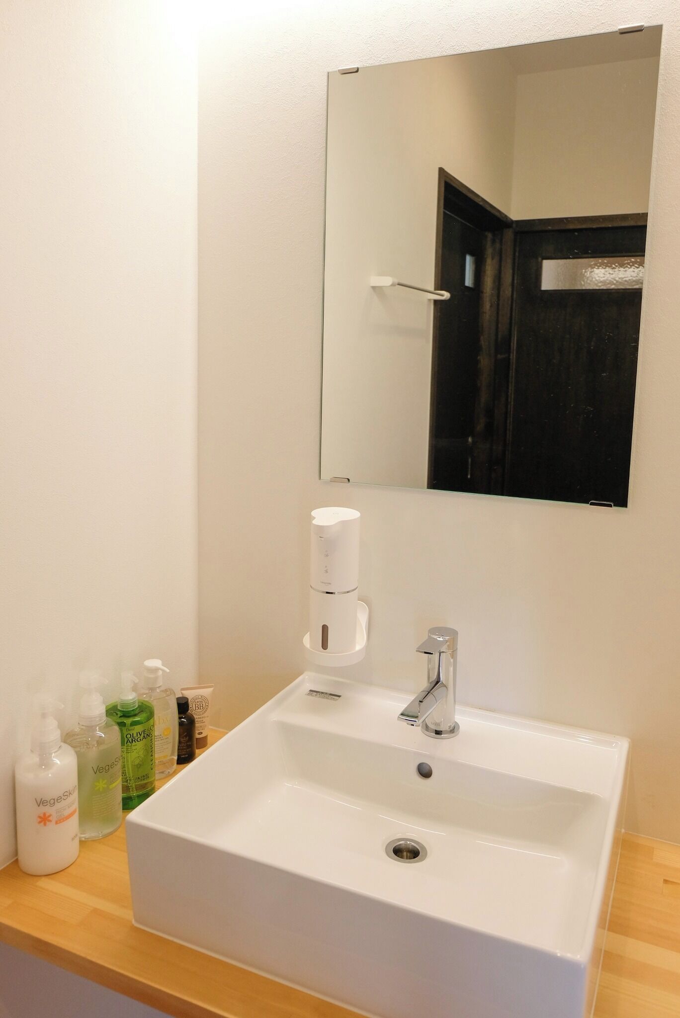 Secador de cabelo, toalhas de banho