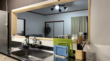 Fridge, microwave, stovetop, cookware/dishes/utensils
