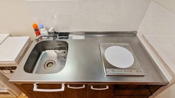 Fridge, microwave, stovetop, cookware/dishes/utensils