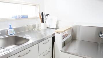 Fridge, microwave, cookware/dishes/utensils